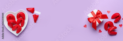 Banner for Valentine's Day with fortune cookies and gift on lilac background