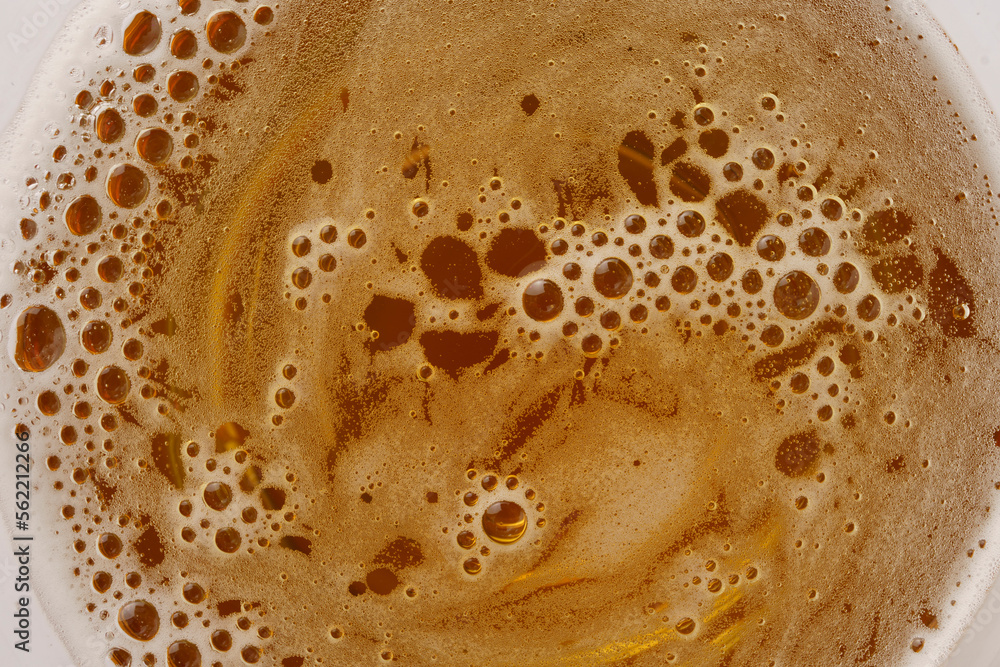 Close-up beer bubbles top view Close-up beer bubbles top view