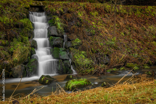 Feldaist river in valley near Rainbach im Muhlkreis in winter day with waterfall photo