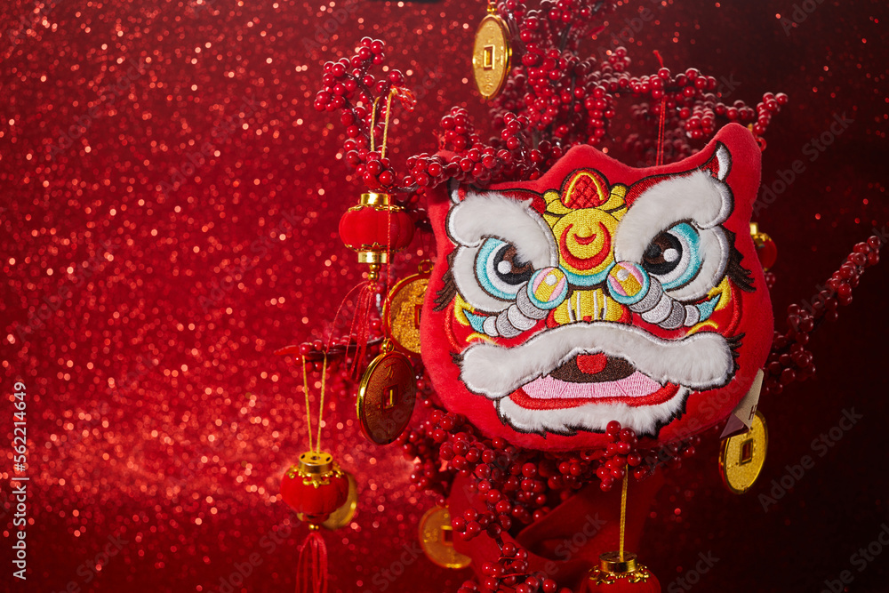 Chinese lion dance for Chinese new year with red lanterns in the background - obrazy, fototapety, plakaty 