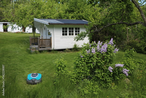 Reduced workload with the Robotic lawnmower in the garden, Sweden