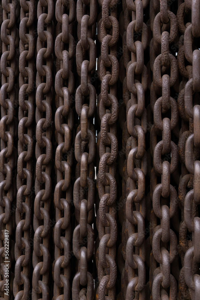 Background of hanging old rusty metal chains Background of hanging old rusty metal chains
