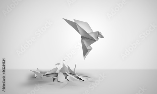 Foto Out Of Nowhere concept of birth or rebirth as an origami bird emerging from a fl