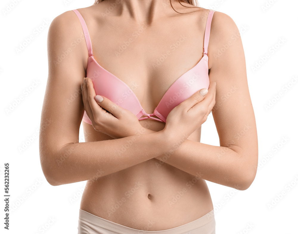 Young woman in underwear on white background. Breast cancer awareness concept