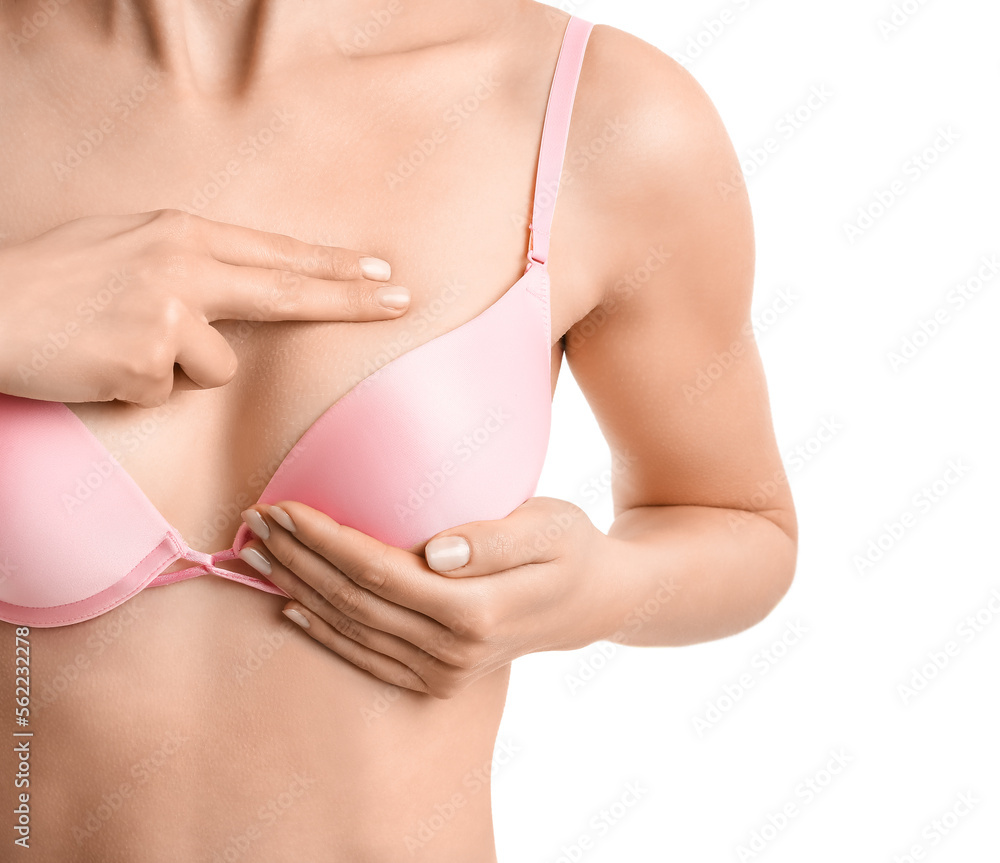 Young woman in underwear on white background, closeup. Breast cancer awareness concept