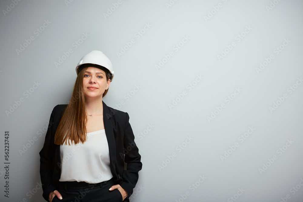 Woman builder in black business suit isolated portrait. Woman builder in black business suit isolated portrait.