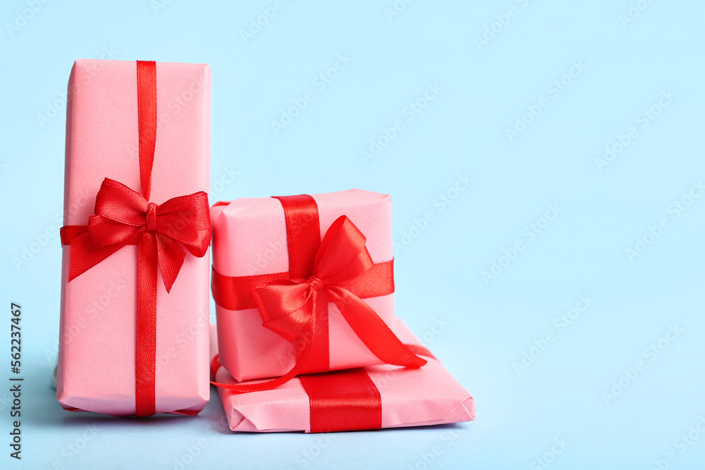 Obraz premium Different gifts for Valentine's Day celebration on color background