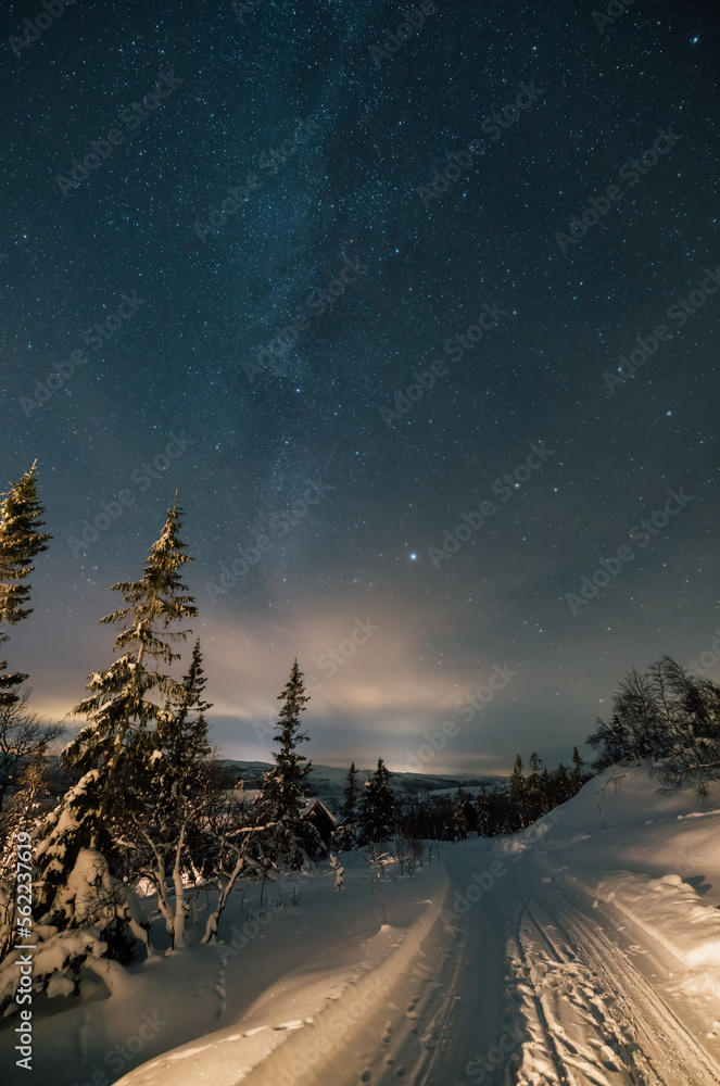 Milky Way Stars Night in the snowy mountains in Norway