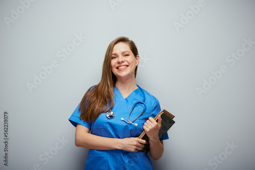 Smiling student woman with medical education holding book. Isolated portrait with copy space.