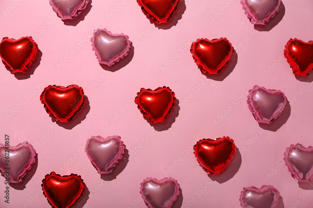 Composition with heart shaped balloons on pink background. Valentine's Day celebration Composition with heart shaped balloons on pink background. Valentine's Day celebration