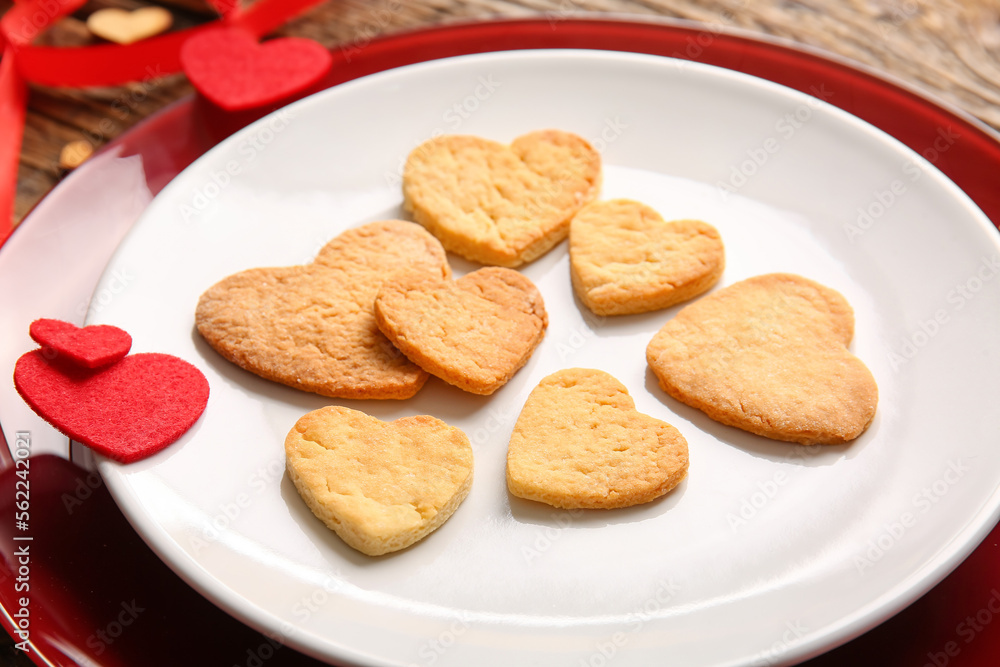 Plate with sweet heart shaped cookies, closeup. Valentines Day celebration Plate with sweet heart shaped cookies, closeup. Valentines Day celebration