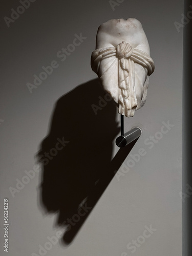 Only small parts of the legs of the sculpture have remained.