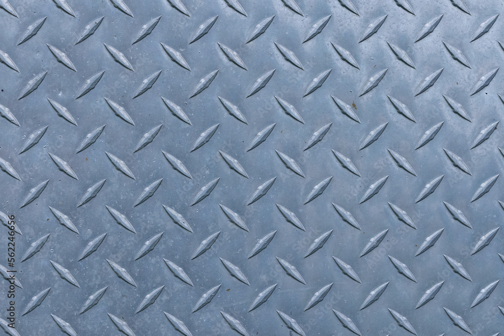 Weathered aluminum diamond plate texture. Weathered aluminum diamond plate texture.