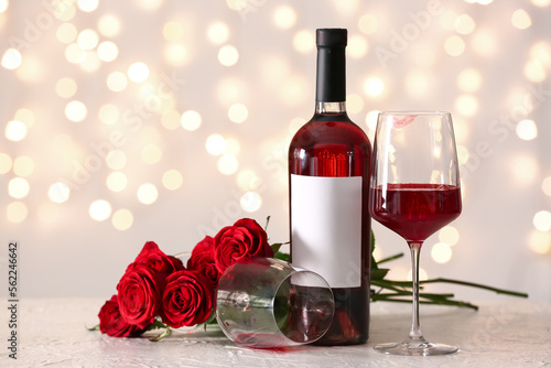 Romantic red wine bottle an...
