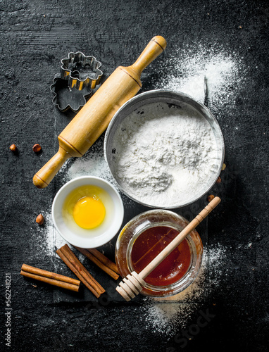 Baking background. Flour with honey, cinnamon and egg.