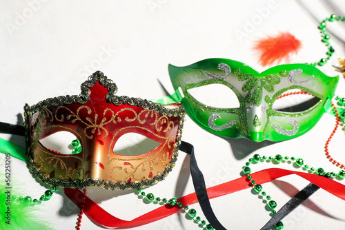 Carnival masks with beads on white background