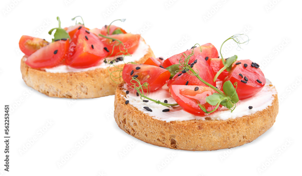 Tasty rusks with cream cheese, fresh tomatoes and black sesame seeds isolated on white Tasty rusks with cream cheese, fresh tomatoes and black sesame seeds isolated on white