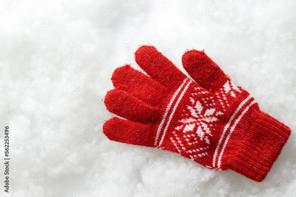 Red warm gloves. Gloves on a white background. Close up.