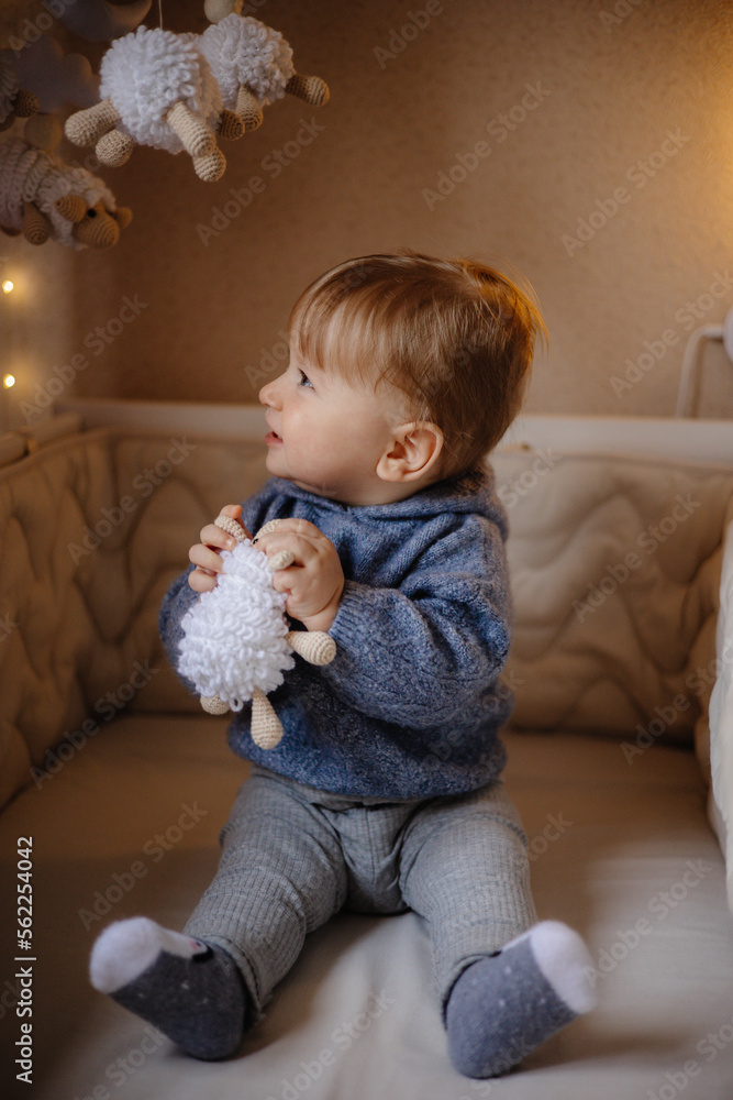 little child playing with toy little child playing with toy