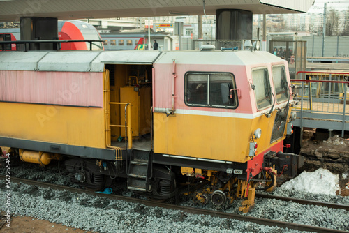 Repair of railway. Yellow train for laying railway tracks.