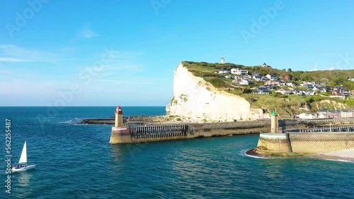 The Port of Fecamp surrounded by the chalk cliffs , Europe, France, Normandy, Seine Maritime, in summer, on a sunny day. photo