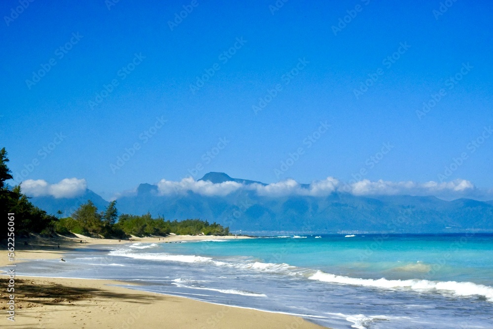 a beautiful sandy beach on the island of Maui