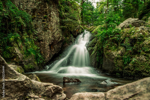 Beautiful landscape with a waterfall in the forest, long exposure photography