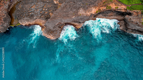 Aerial Capture of Turquoise Water and Steep Cliffs in Bali, Indonesia