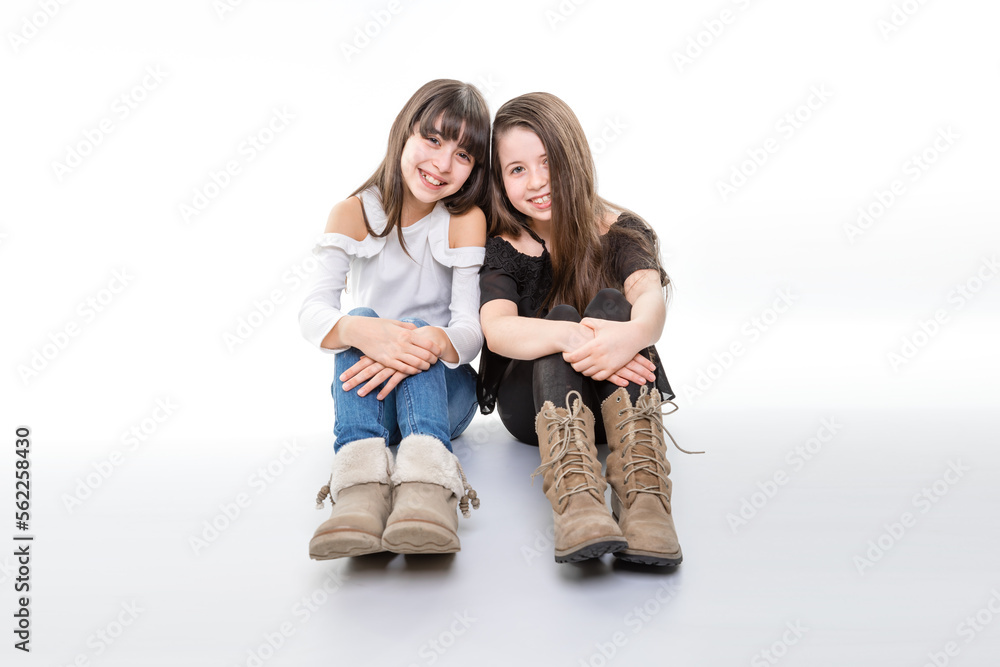 two child girls are sisters and best friends show togetherness and 