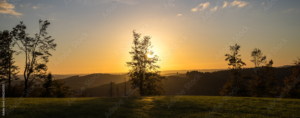 a sundown over the siegerland landscape in germany panorama a sundown over the siegerland landscape in germany panorama