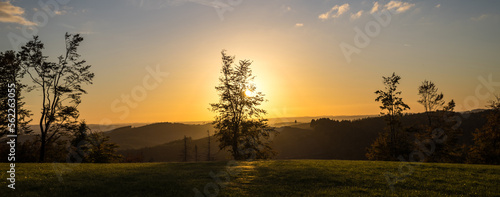 a sundown over the siegerland landscape in germany panorama