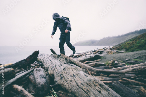 A man hikes in the rain on the Puget Sound's Whidby Island in Washington. photo