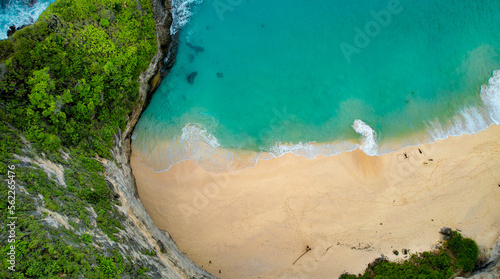 Drone Aerial Famous Kelingking Beach in Nusa Penida, Indonesia Zoom Shot