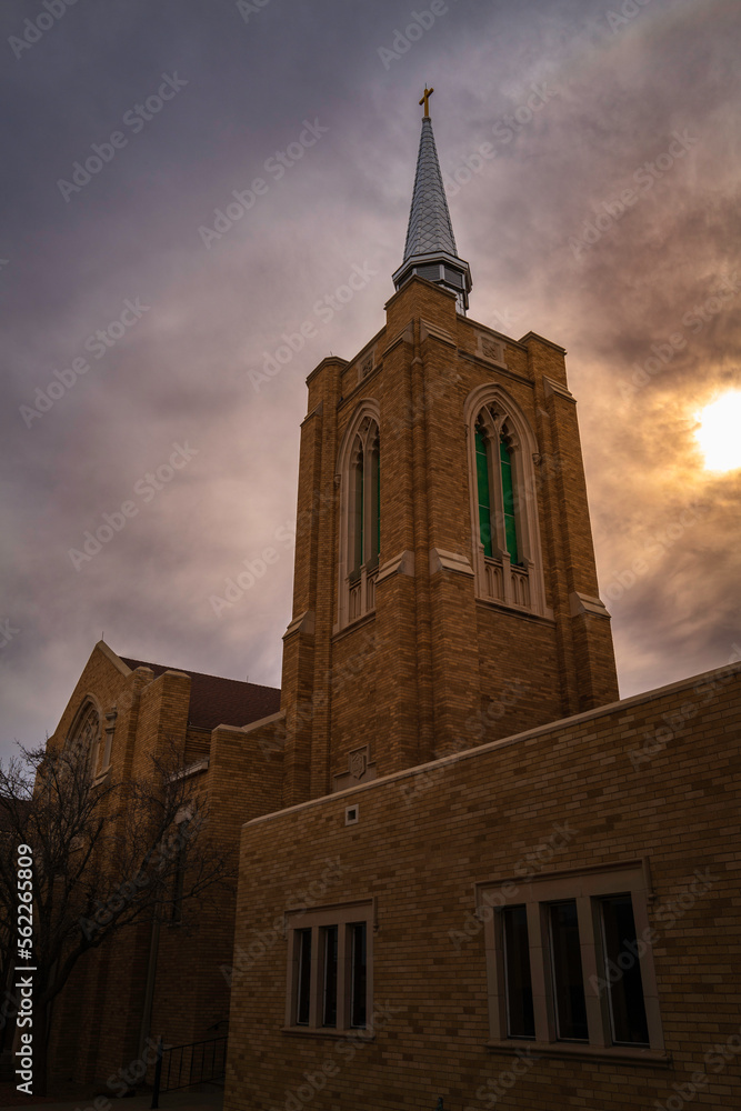 Church building on the city street and dramatic cloudscape, the First Baptist Church in Odessa, Texas, USA Church building on the city street and dramatic cloudscape, the First Baptist Church in Odessa, Texas, USA