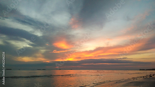 enjoy a beautiful and sunny sunset on the beach