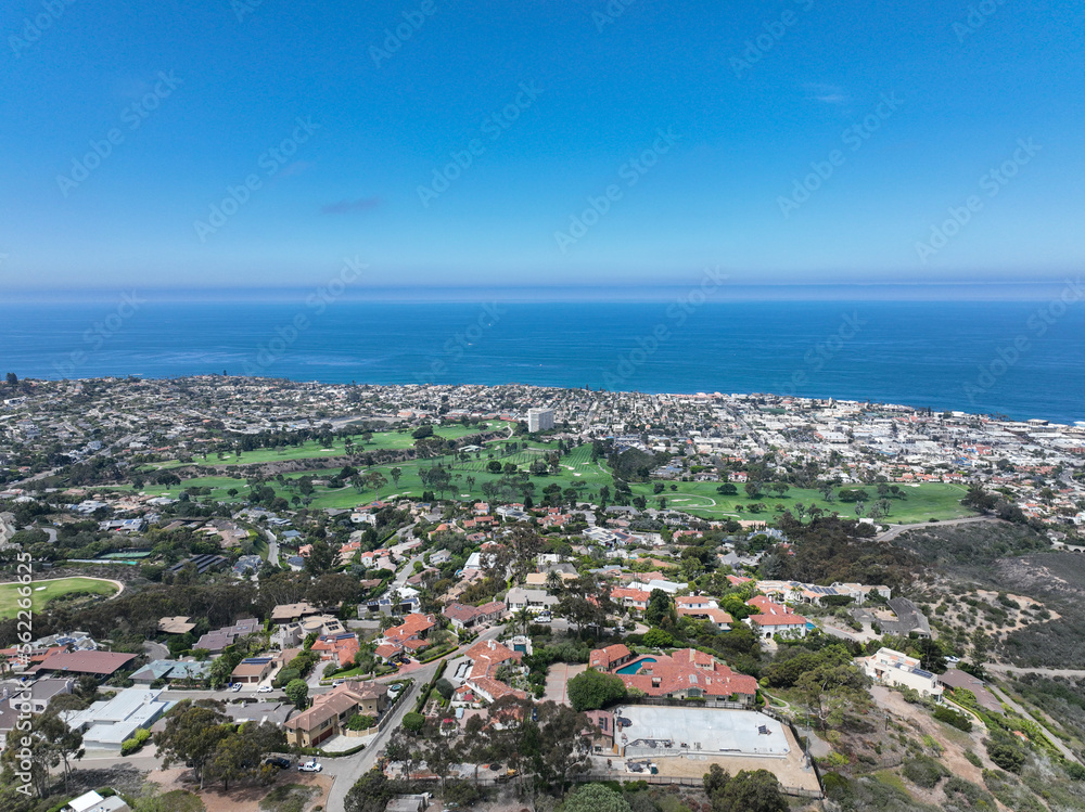 Aerial view over La Jolla Hills with big villas and ocean in the background, San Diego, California, USA Aerial view over La Jolla Hills with big villas and ocean in the background, San Diego, California, USA