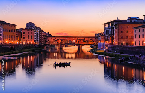 Fototapeta Famous Ponte Vecchio bridge on the river Arno River at sunset, Florence, Italy
