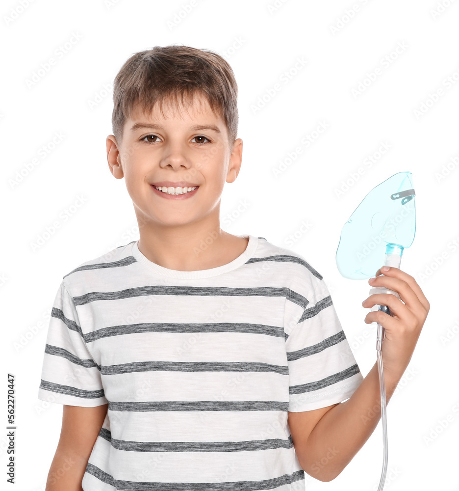 Boy holding nebulizer for inhalation on white background. Space for text Boy holding nebulizer for inhalation on white background. Space for text