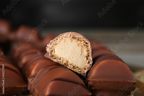 Many tasty chocolate bars, closeup. Delicious snack