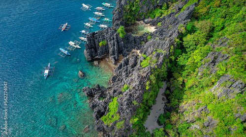 Drone Aerial of Secret Beach, Lush Green Trees, karst, El Nido, Palawan, Philippines