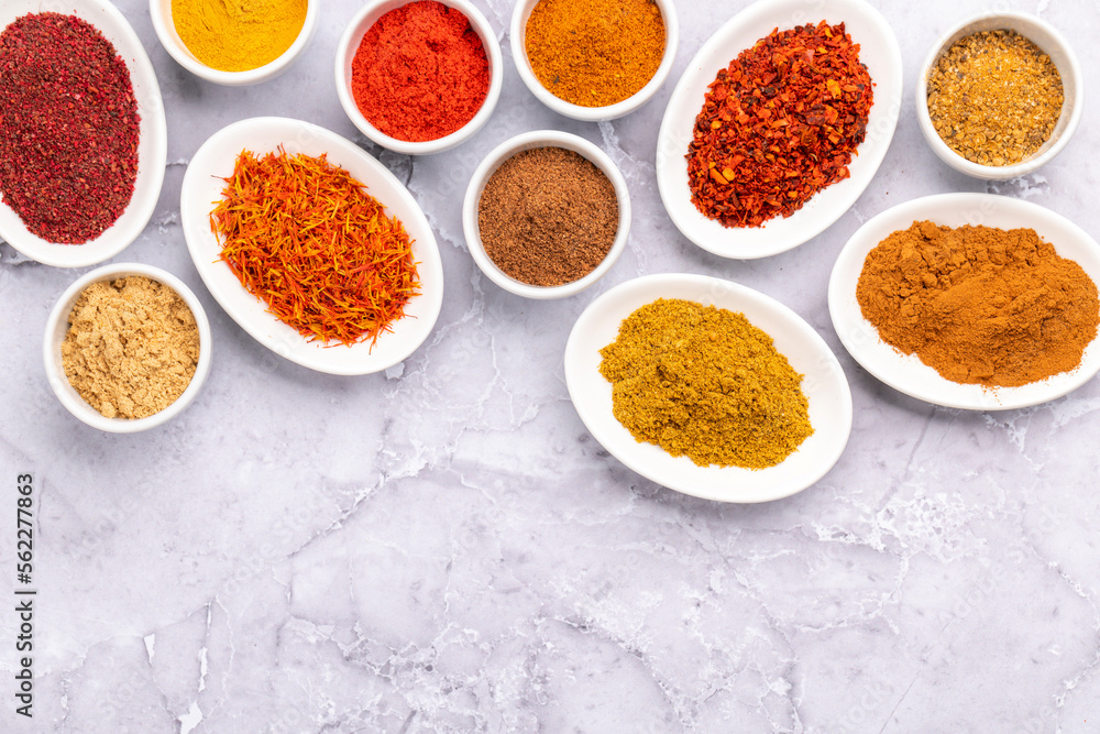 Various dried spices in small bowls Various dried spices in small bowls