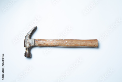 used hammer with wooden handle isolated on white background 