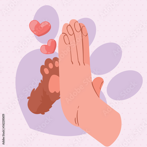 owner hand with pet paw