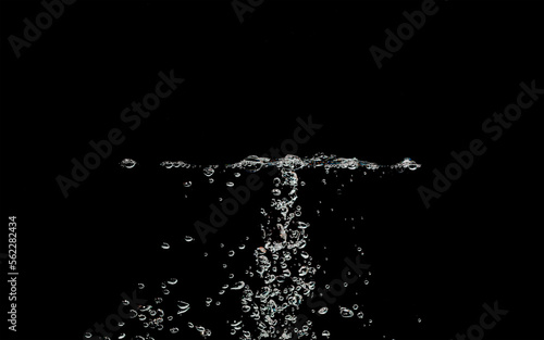 Water bubbles splash isolated on black background. 