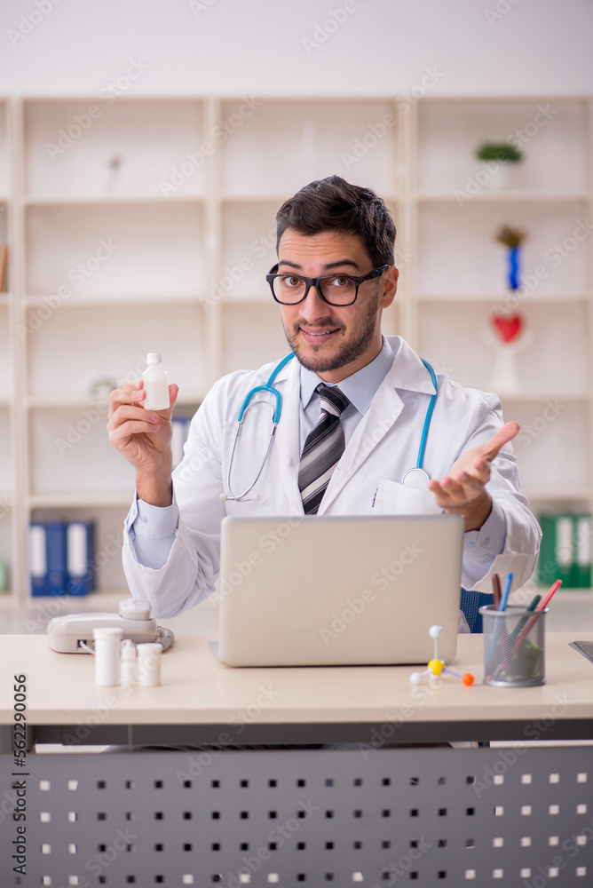 Young male doctor working at the hospital Young male doctor working at the hospital