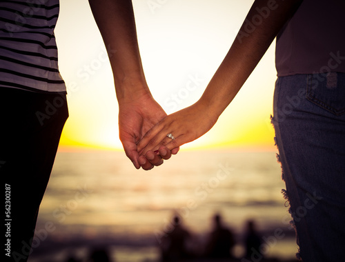 couple holding hands together