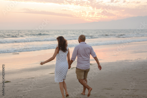 couple walking on the beach