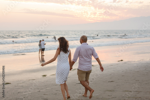 couple walking on the beach