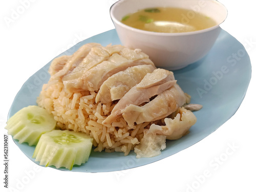 Hainanese chicken rice served on a plate with soup