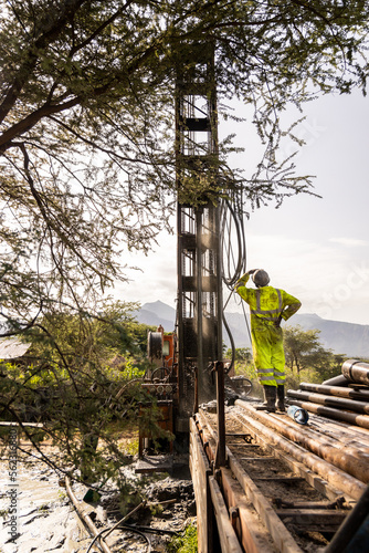 Worker on a drilling site, Karamoja, Uganda photo